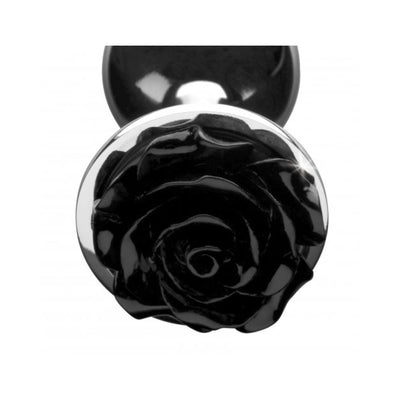 Small black rose-shaped metal anal plug with smooth polished finish and reflective silver base.