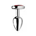 Small polished silver metal anal plug with a deep red heart-shaped gem at the base.