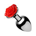 Small metal anal plug with a shiny silver finish and a decorative red rose flower base.