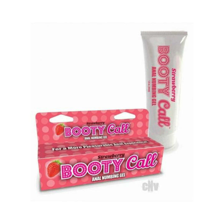 Strawberry flavored Booty Call anal numbing gel tube with matching pink polka dot box packaging.