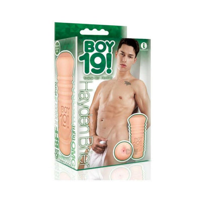 Packaging of Boy 19! Teen Twink Stroker featuring a shirtless male model and the product image in flesh tone.