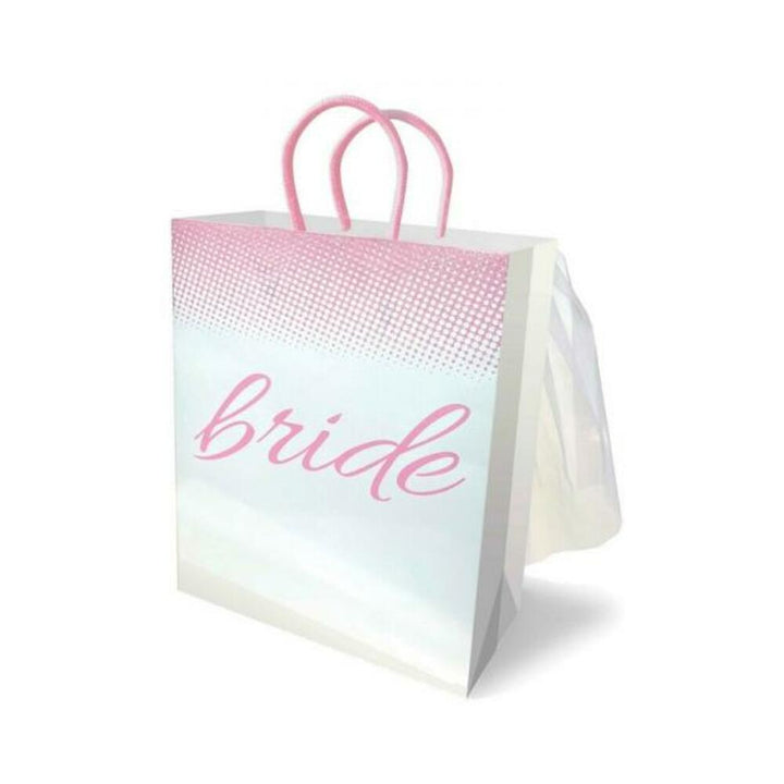 White and pink bride gift bag with elegant script and attached delicate veil on the back, featuring pink woven handles.