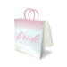 White and pink bride gift bag with elegant script and attached delicate veil on the back, featuring pink woven handles.