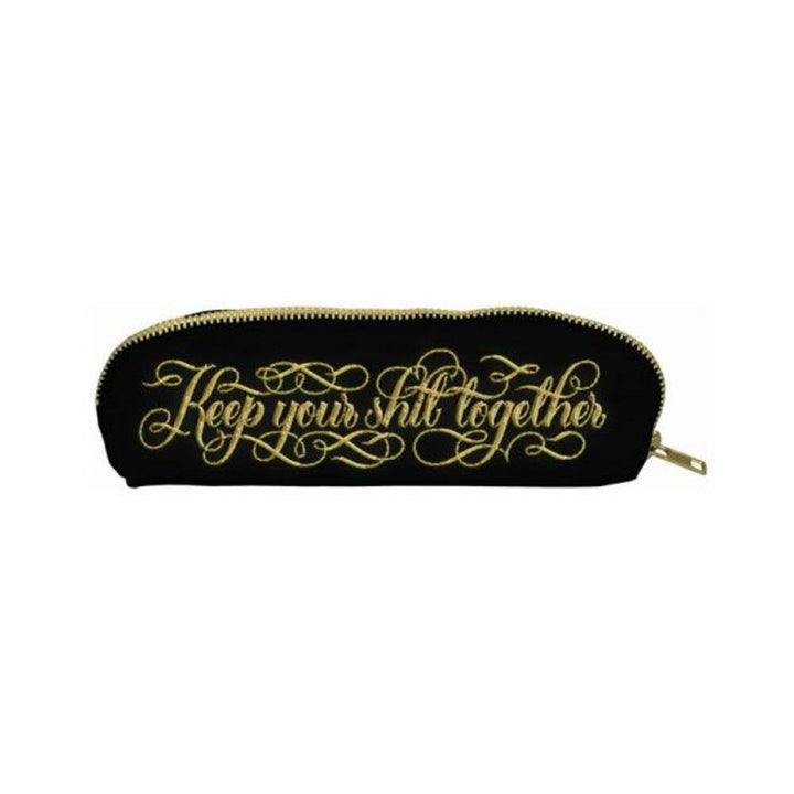 Black canvas pouch with gold zipper and elegant gold script embroidery reading Keep your shit together