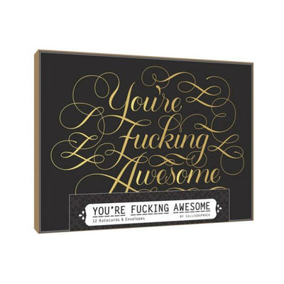 Box of 12 black notecards with gold foil calligraphy reading You're Fucking Awesome, includes envelopes.