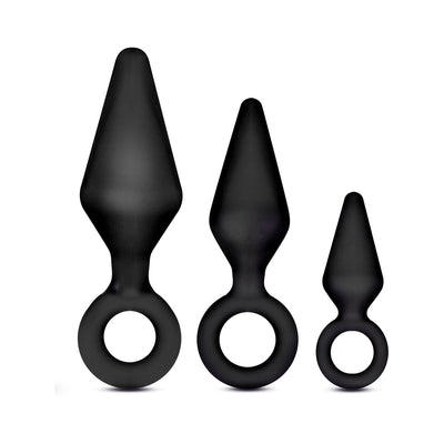 Set of three black silicone anal training plugs in small, medium, and large sizes with ring handles for easy use.