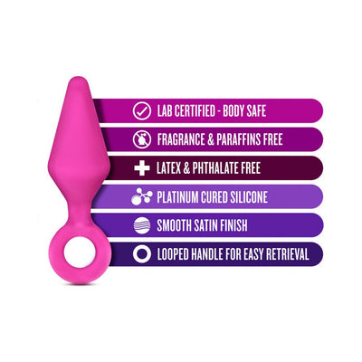 Pink silicone plug with looped handle and text highlighting body-safe, fragrance-free, latex-free, platinum cured silicone, and smooth satin finish.