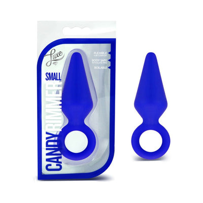 Small indigo silicone Candy Rimmer plug with tapered shape and safety ring, shown in packaging and separately.