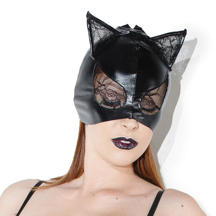 Black wetlook cat mask with lace-covered eyes and ears worn by a model with dark lipstick