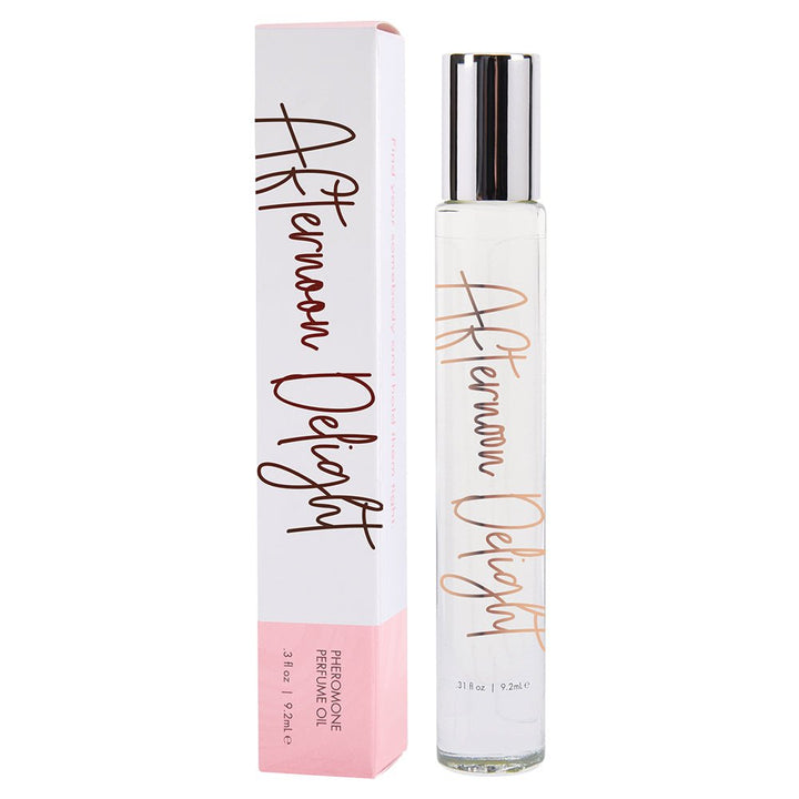 Cgc Afternoon Delight pheromone perfume oil in clear glass roller bottle with pink and white packaging.