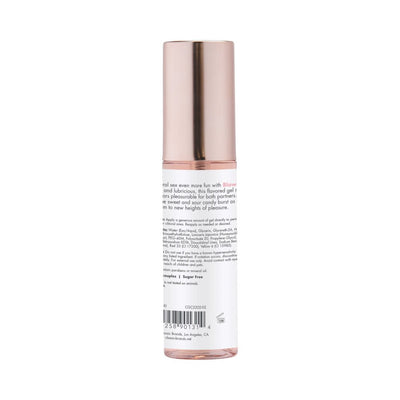 Bottle of CG Blow Me Oral Berry Burst flavored gel with rose gold cap and product information on label