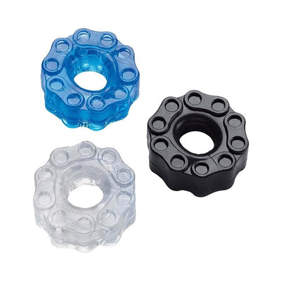 Three chain-link design cock rings in black, blue, and clear silicone with a flexible, textured finish.