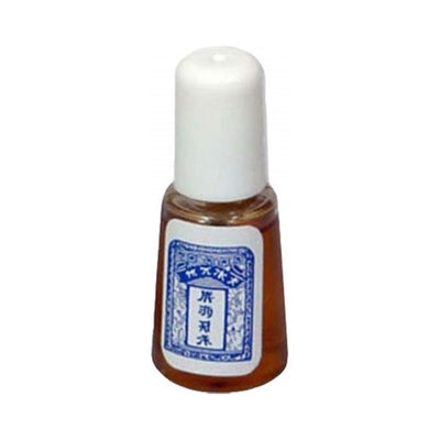 Small brown bottle with white cap and blue traditional Chinese label for intimacy enhancement spray.