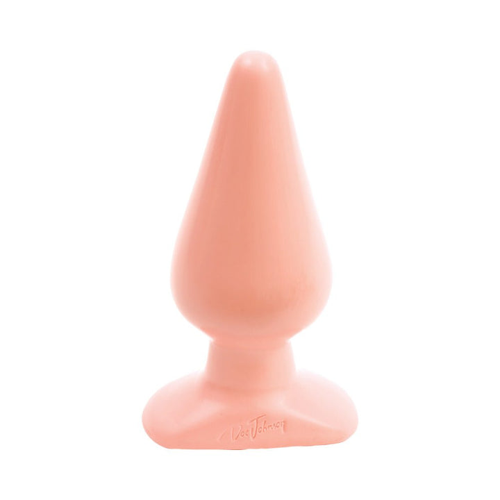 Smooth large classic tapered butt plug in soft peach color with flared base for secure use.