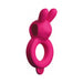 Pink silicone vibrating ring with dual bunny ears for couples, designed for enhanced pleasure and comfort.