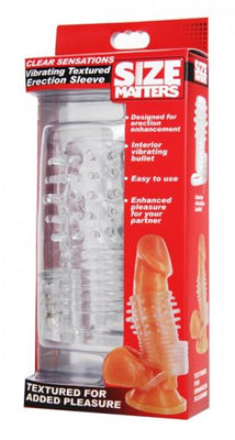 Clear textured vibrating erection sleeve with retention strap in red and clear packaging for enhanced pleasure.