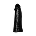 Black silicone vibrating dildo replica with realistic texture and shape on white background