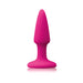 Bright pink mini plug with smooth tapered design and flared base on white background.