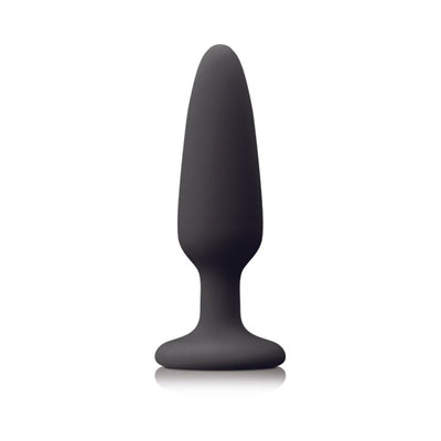 Small tapered silicone plug with a sturdy suction cup base in matte black finish.