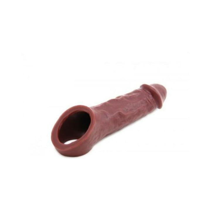 Caramel-colored VixSkin by Vixen Colossus S silicone sleeve with testicle strap, designed for a comfortable fit and enhanced size.