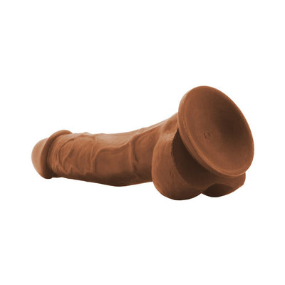 Brown dual density realistic dildo with suction cup base, 5-inch length, and lifelike texture.