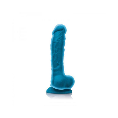 Blue dual density silicone realistic dildo with suction cup base standing upright on white background.