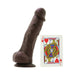 Chocolate brown 5-inch silicone dildo with suction base next to a Jack of Hearts playing card for size comparison.