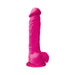 Bright pink realistic silicone dong with suction cup base, textured surface, and slight curve for enhanced stimulation.