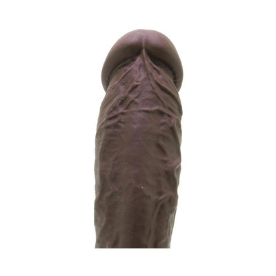 Close-up view of dark brown realistic silicone dildo with detailed texture and smooth finish.