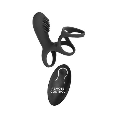 Black silicone vibrating cock cage with textured clitoral stimulator and matching remote control.