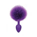 Purple silicone anal plug with large fluffy faux fur bunny tail attachment.