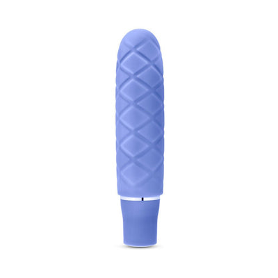 Periwinkle blue mini stimulator with textured diamond pattern and smooth satin finish.