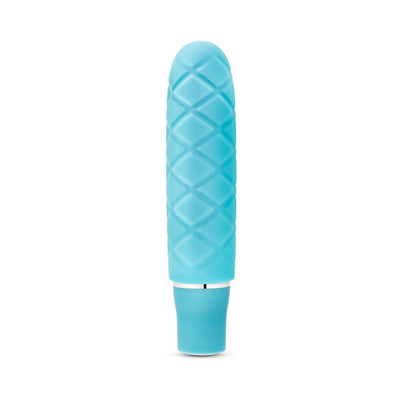 Periwinkle blue mini stimulator with textured diamond pattern and smooth satin finish.