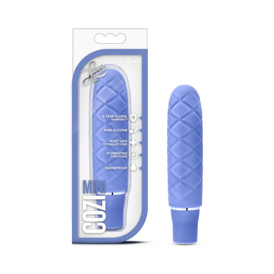 Periwinkle blue mini stimulator with textured silicone surface and compact design shown with packaging.
