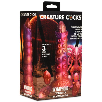 Packaging of Creature Cocks Nymphoid Ovipositor silicone dildo featuring a colorful tentacle design with three soft silicone eggs.