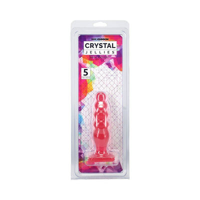 Doc Johnson Crystal Jellies 5-inch graduated anal plug in pink, packaged in clear plastic with colorful geometric background.