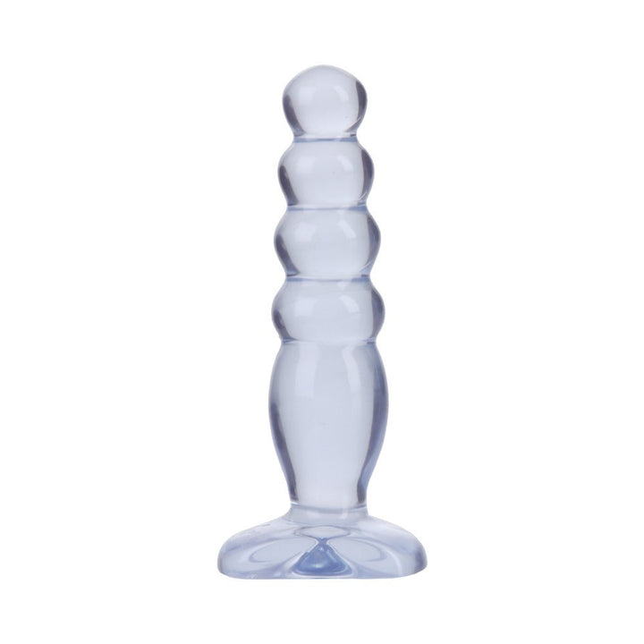 Transparent purple graduated anal plug with rounded tiers and flared base for safe use.