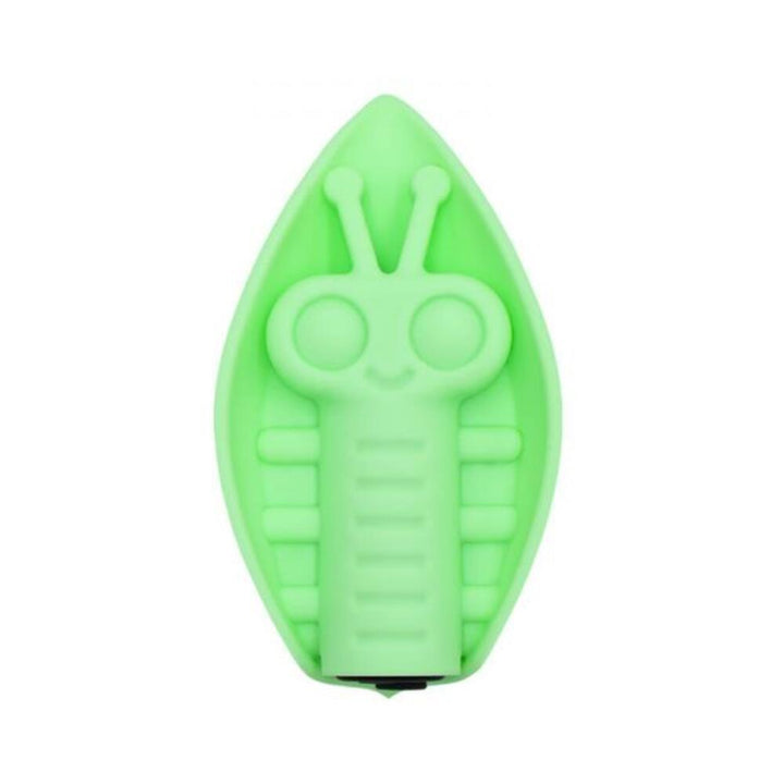 Green silicone vibrating toy shaped like a playful insect resting on a leaf with textured details.