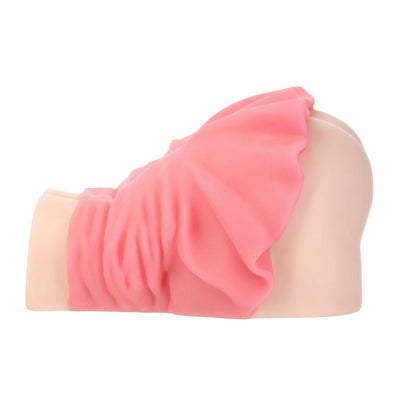 Side view of a soft, flesh-toned masturbator with a pink mini skirt detail from the Cutiepies Cheerleader Cherry collection.