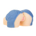 Compact lifelike masturbator in blue cut-off shorts with realistic skin texture and dual openings.