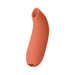 Dame Aer Air Pulse Stimulator in terracotta with smooth curved design and air pulse opening.