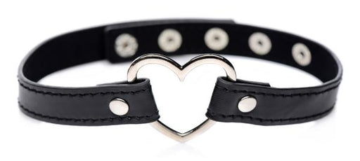 Black vegan leather choker with adjustable snap closures and a central silver-tone heart-shaped metal detail.