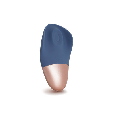 Compact blue and rose gold silicone device designed for gentle external stimulation with a smooth, ergonomic shape.