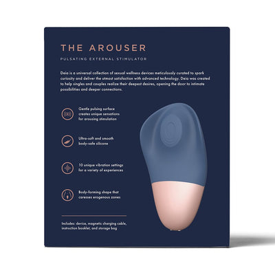 Deia The Arouser silicone external stimulator in blue with rose gold base shown on navy blue product packaging.