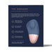 Deia The Arouser silicone external stimulator in blue with rose gold base shown on navy blue product packaging.
