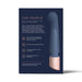 Packaging of Deia The Couple silicone blue dual-motor G-spot and bullet massager with product features and charging stand shown.