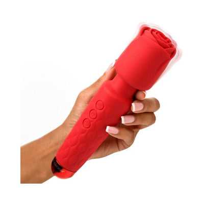 Hand holding a red Bloomgasm Pleasure Rose Wand with textured handle and rose-shaped silicone attachment.