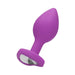 Purple silicone butt plug with a tapered shape and a diamond-shaped gem at the flared base.