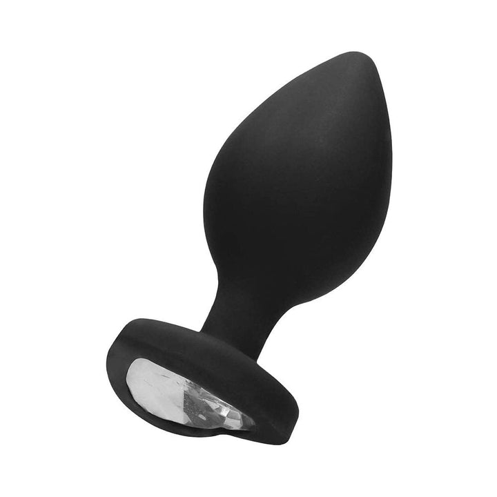 Extra large black silicone butt plug with a tapered shape and a clear diamond-shaped gem at the flared base.