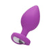 Extra large purple silicone butt plug with a tapered shape and a clear diamond-shaped gem at the flared base.